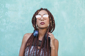 portrait of a mixed raced woman with cool glasses