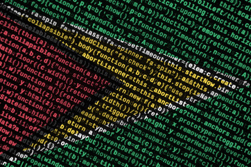 Guyana flag  is depicted on the screen with the program code. The concept of modern technology and...