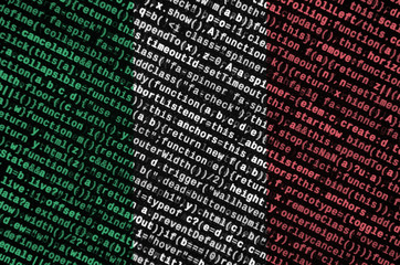 Italy flag  is depicted on the screen with the program code. The concept of modern technology and...