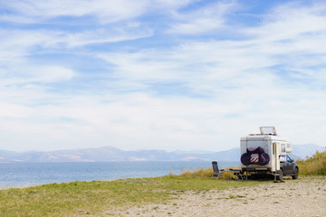 Camper car on beach. Travel