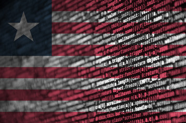 Liberia flag  is depicted on the screen with the program code. The concept of modern technology and...