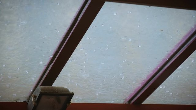 Extreme weather hail hits the glass roof