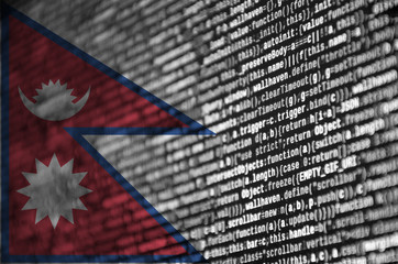 Nepal flag  is depicted on the screen with the program code. The concept of modern technology and...