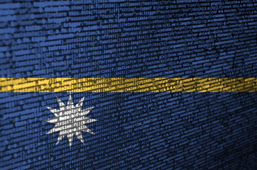 Nauru flag  is depicted on the screen with the program code. The concept of modern technology and...
