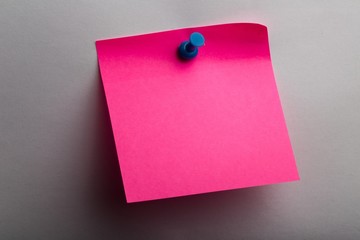 Pink Sticky Note with Pin on Grey Background