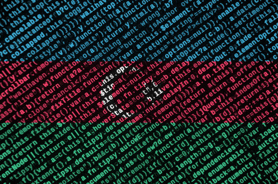 Azerbaijan flag  is depicted on the screen with the program code. The concept of modern technology and site development - Powered by Adobe