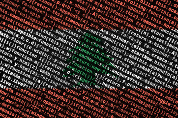 Lebanon flag  is depicted on the screen with the program code. The concept of modern technology and...