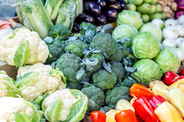 Vegetable farmer market counter. Colorful heap of various fresh organic healthy vegetables at grocery store. Healthy natural food background