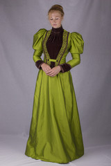 Victorian woman in green ensemble
