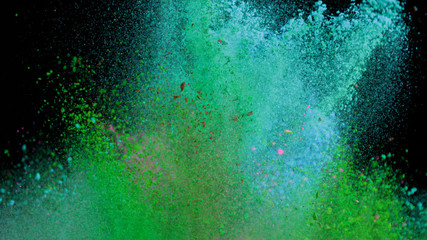 Multi-color powder explosion on black background
