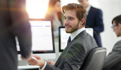 businessman working on a computer on business reports