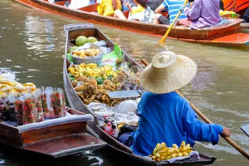 Poster Damnoen Saduak floating market, The famous attractions of Ratchaburi province. It is the most famous floating market in Thailand and is known for tourists around the world. © chiradech