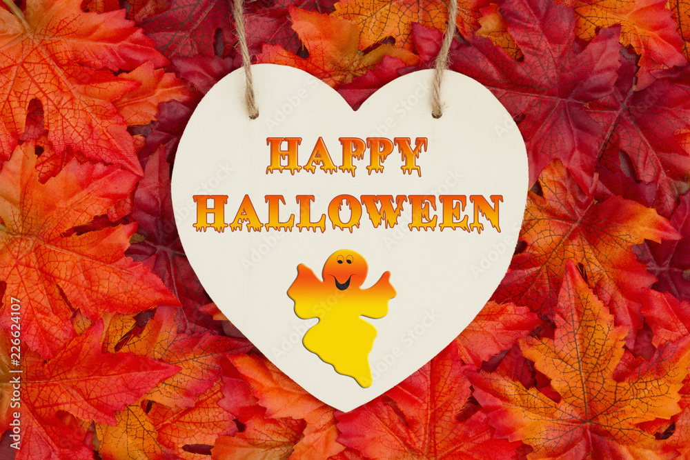 Wall mural Happy Halloween greeting with fall leaves - Wall murals