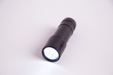 LED flashlight, on white background