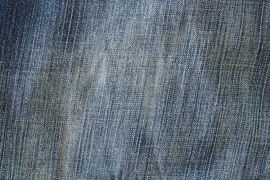 Blue fabric./ Texture of denim jeans background
