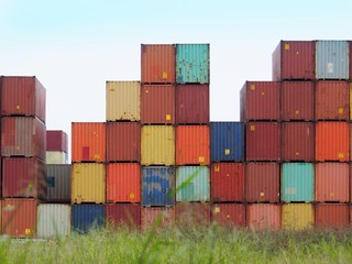 Fototapeta premium Stack of containers in the open space for import export,logistic concept