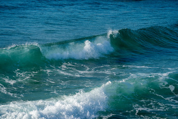 Small Ocean wave breaking in deep water