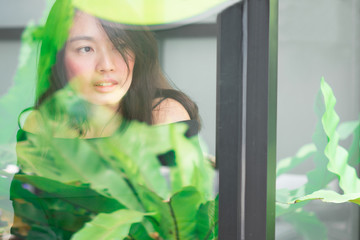Fototapeta premium Women sitting by the window at coffee shop for relax