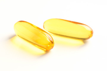 fish oil capsules isolated on white