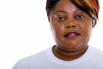 Close up of happy fat black African woman smiling ready for gym