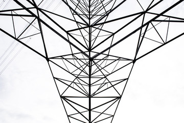 Bottom view of electricity pylon of high voltage electricity, construction of electricity pole