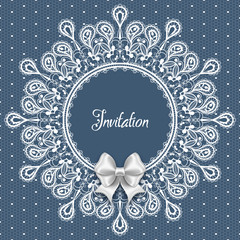 Wedding card or invitation template with a filigree lace round frame and white satin bow