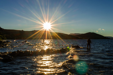 pescando al amanecer