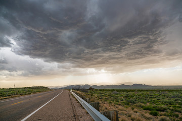 Roadway and stormy clouds
