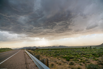 Roadway and stormy clouds