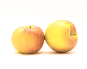 Studio shot close-up two Fuji apples isolated on white background. Fresh raw organic Colorado growth fruit, originated in Fujisaki, Japan. © trongnguyen