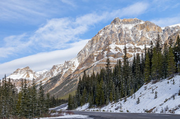 Highway Through Rocky Mountains in Early Winter