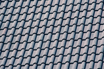 Decorative tiles on the roof of the house