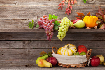 Autumn with pumpkins and fruits