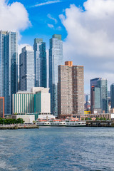 Fototapeta premium New York City, July 24, 2018 Manhattan Midtown skyline at dusk over Hudson River, New York City