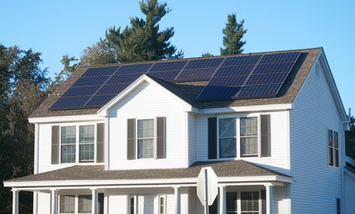 solar panel installed on the house roof - Powered by Adobe
