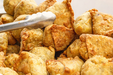 Fresh hot pies are on the street. Close-up