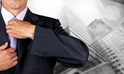 Confident business man wearing elegant suit on