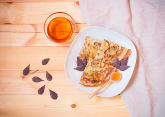Homemade pancakes with honey. Top view.
