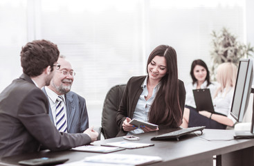 professional business team working with financial graphs in the workplace
