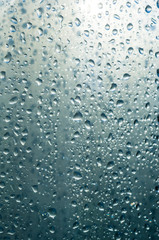 Obraz premium background of raindrops on window glass, close up