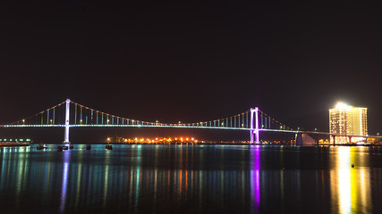 Night sweeping bridges of the city of Da Nang, Vietnam.