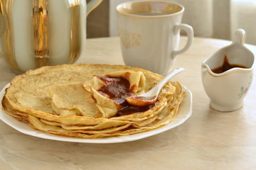 Pancakes /crepes/ with caramel sauce