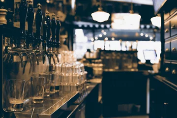Foto auf Leinwand Classic bar with bar counter and beer taps © Zarya Maxim
