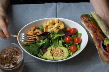 shrimp and avocado salad and salami Prosciutto Sandwich with coffee