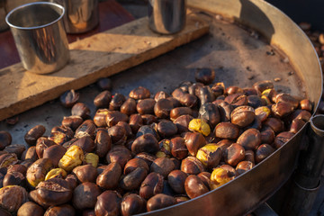 Roast chestnuts cooked over the red-hot grill,