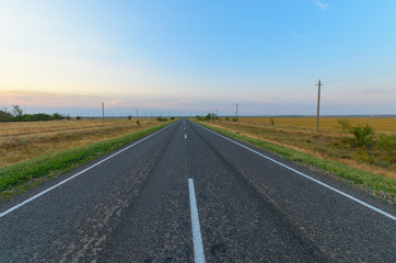 Paved road in the steppe.