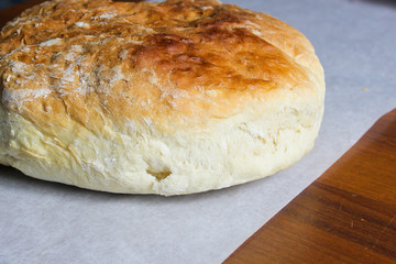 Round homemade loaf of bread on a table