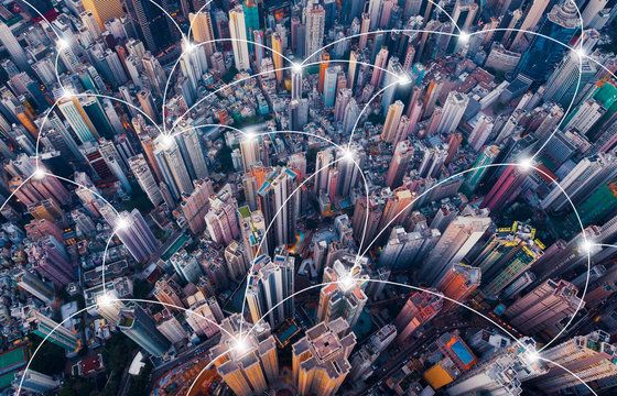 Digital Network Connection Lines Of Hong Kong Downtown. Financial District And Business Centers In Smart City In Technology Concept. Top View Of Skyscraper And High-rise Buildings. Aerial View