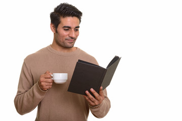 Young handsome Persian man against white background