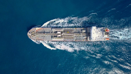 Large crude oil tanker roaring across The Mediterranean sea - Aerial image 
